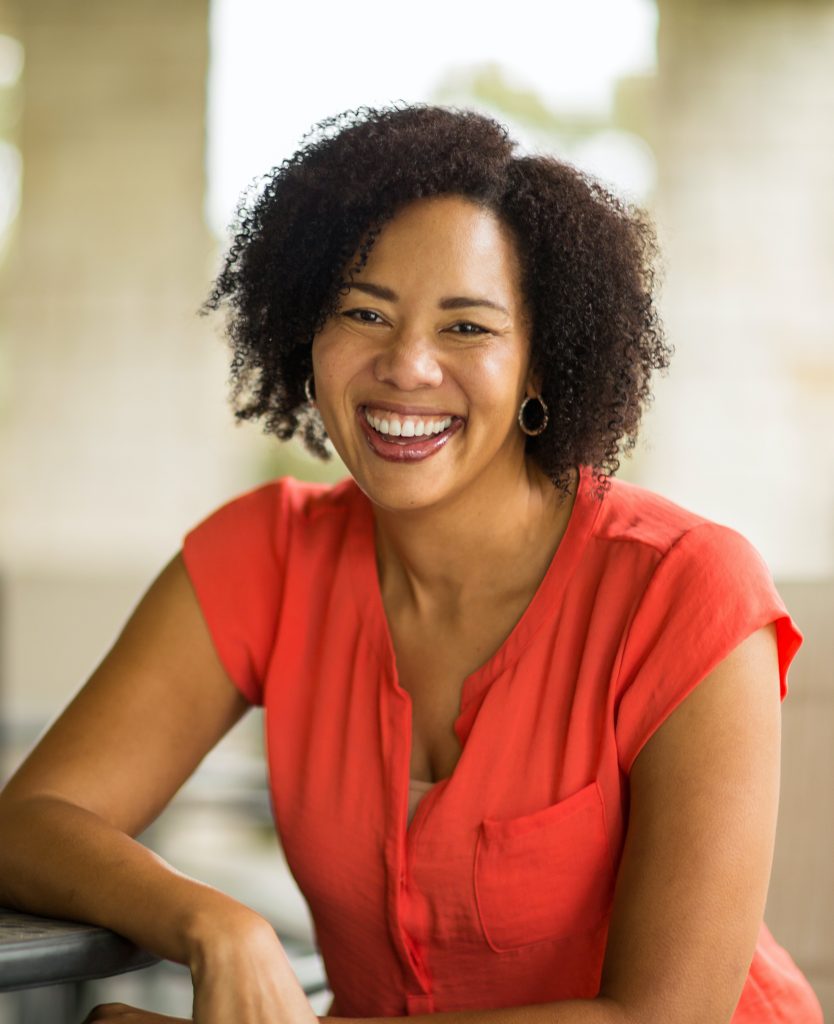 Happy woman wearing a red dress